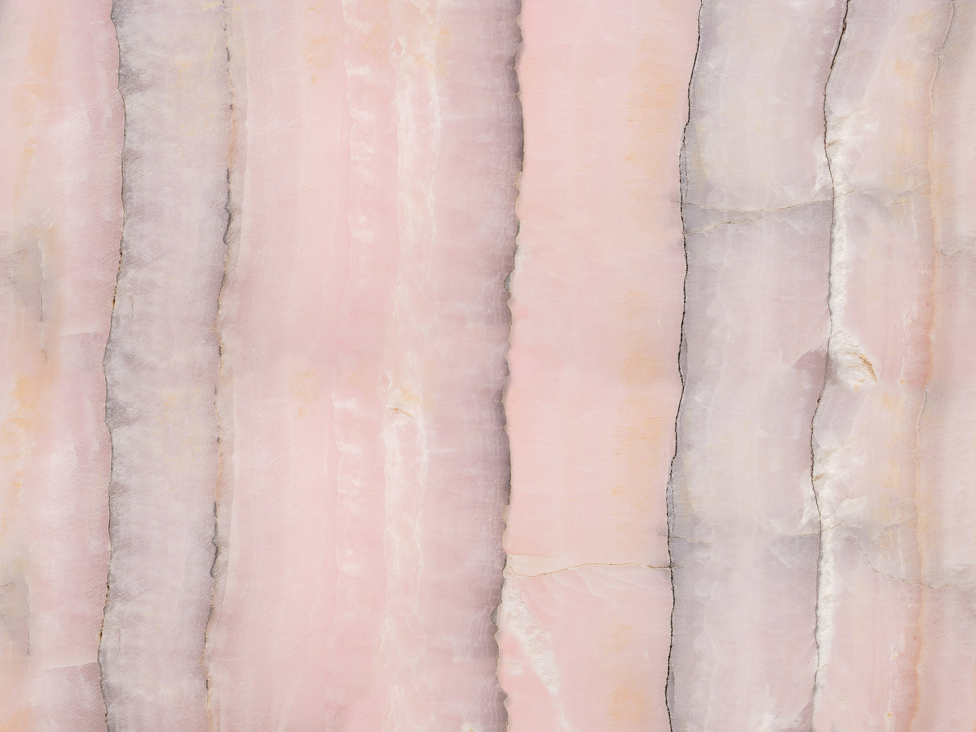 Lightened slices marble onyx. Horizontal image. Warm pink colors. Beautiful close up background